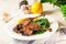 Duck legs confit with orange and salad