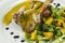 Duck legs with orange sauce and lamb`s lettuce salad with oranges and vinegar