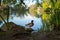 A duck stands on the stone at Stow Lake