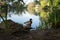 A duck stands on the stone at Stow Lake