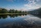 Ducks swim down Rhine River at dawn near Benkastel, Germany