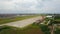 Due to Coronavirus Covid-19 airline fleet parked at the Airport. Aerial drone view of airplanes parked on airport