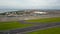 Due to Coronavirus Covid-19 airline fleet parked at the Airport. Aerial drone view of airplanes parked on airport