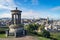 Dugald Stewart monument on Calton Hill with a view on Edinburgh