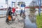 Duisburg Germany - January 08 2017 : Bike drivers surprised by the river Rhine flooding the promenade