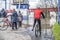 Duisburg , Germany - January 08 2017 : Bike drivers surprised by the river Rhine flooding the promenade