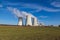 Dukovany Nuclear Power Plant in the Czech Republic, Europe. Smoke cooling towers. There are clouds in the sky. In the background