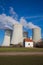 Dukovany Nuclear Power Plant in the Czech Republic, Europe. Smoke cooling towers. There are clouds in the sky. In the background