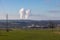 Dukovany nuclear power plant in the Czech Republic, Europe. Smoke cooling towers. There are clouds in the sky. In the foreground