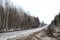 Dull, dirty road in early spring, late autumn or winter in Russia