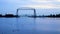 Duluth Minnesota aerial lift bridge with Canada Geese in foreground in early morning.