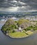 Dumbarton castle building on volcanic rock aerial view from above Scotland