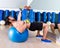 Dumbbell chest press on fit ball man workout