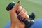 Dumbbell in the female hands sport time