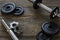 Dumbbells gymnastic on a wooden background 2