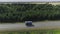 Dump truck driving on highway. Scene. Top view of dump truck on highway in summer. Truckers and dump trucks on country