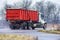 Dump Truck Driving In Mixed Rain and Snow