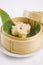 Dumplings in bamboo steamer