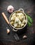 Dumplings with beef, garlic cloves and rosemary