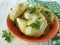 Dumplings parsley, green onions table delicious eat on a white wooden background fork