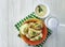 Dumplings parsley sauce kitchen traditional fork appetizer homemade napkin lunch on a white wooden background