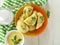 Dumplings parsley sauce traditional hot homemade napkin lunch on a white wooden background