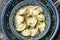 Dumplings in the soup chuchvara banner, menu, recipe place for text, top view. Uzbek cuisine