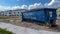 A dumpster full of trash in the yard of a new townhome that is under construction in Laureate Park Lake Nona Orlando, Florida