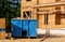 Dumpster, recycle waste and garbage bins near new construction site of appartment houses building