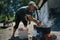 Dunavatu de Jos, Romania, August 8, 2016: Fishermen cooking the fish catched