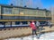 DUNDAS, CANADA - MARCH 1, 2021: FAMILY EXPLORES UNDER A TRAIN AT DUNDAS VALLEY CONSERVATION AREA