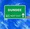 DUNDEE road sign against clear blue sky