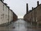 DUNDEE, UK, 18 FEBRUARY 2020 A photograph of Chandler`s Lane, on the docks of Dundee on a grey, rainy day with the Tay Road Bridg
