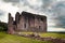 Dundonald Castle Ruins on a cloudy day with green grass