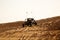 Dune Buggies being driven by tourists at aa Desert Safari park in the red sand dunes near Dubai