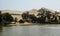 And dune buggies and tourists on sand dunes around Huacachina oasis at Ica, Peru