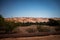 Dune formation behind a palm forest in Wahiba Sands desert, Oman