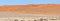 Dune and Oryx panorama of the Namibrand area in Namibia