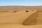 Dune riding in arabian desert