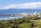 Dune Vegetation Coastal Landscape Against Blue Cloudy Skyline