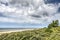 Dunes, beach, sea and clouds