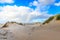 Dunes on Dutch North Sea coast at IJmuiderslag with wind sweeping stripes in the sand