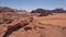 dunes in red desert with rocks Wadi Rum in Jordan