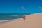 The dunes of Taroa |Man walks over the sand to the beach - Tourism |Punta Gallinas Colombia Travel