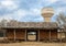 Dunn/Tirk log barn and old water tower in McPherson Park in Colleyville, Texas.