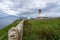 Dunnet Head lighthouse on Pentland Firth, Scotland on a cloudy day