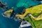 Dunquin or Dun Chaoin pier, Ireland\\\'s Sheep Highway. Aerial view of narrow pathway winding down to the pier