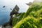 Dunquin or Dun Chaoin pier, Ireland\\\'s Sheep Highway. Narrow pathway winding down to the pier,