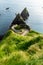 Dunquin or Dun Chaoin pier, Ireland\\\'s Sheep Highway. Narrow pathway winding down to the pier, ocean coastline, cliffs.