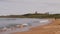 Dunstanburgh Castle seen from Embleton Bay, England